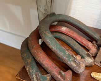 Set of vintage painted horseshoes
