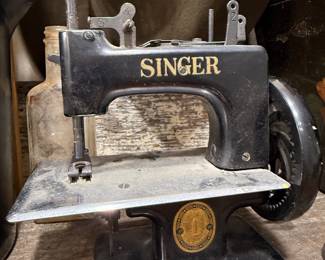 Antique Singer toy sewing machine