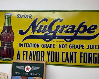Drink NuGrape metal advertising sign