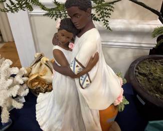 Ceramic figurine of embracing couple