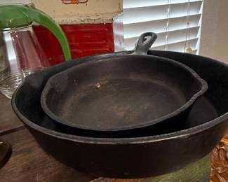 Two antique cast iron skillets