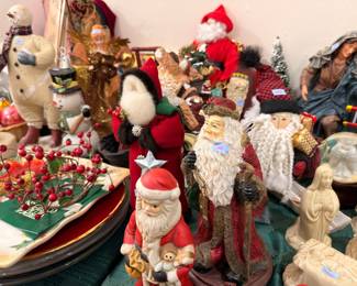 Collection of Santa Claus and snowman figurines