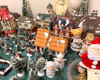 Christmas village houses with snowbabies and angels
