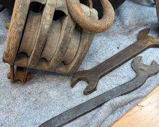 Antique wooden block and tackle with large wrenches