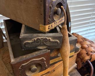 Stack of antique carved wood drawers