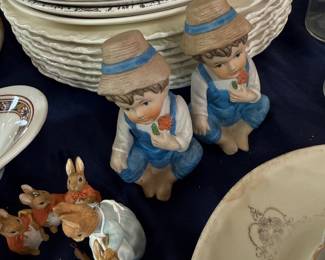Bisque boy figurines and rabbit family figurines
