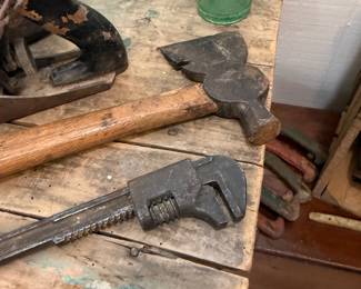 Antique monkey wrench, hatchet and wood plane