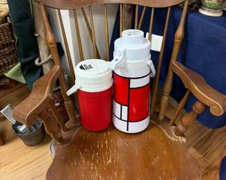 Maple captain's chair with vintage picnic thermos jugs