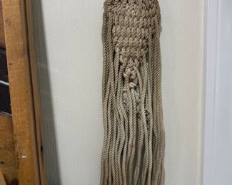 Braided rope macrame wall hanging with iron ring