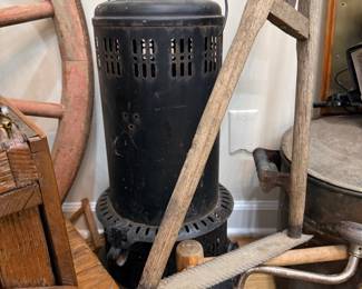 Antique kerosene heater with wire bail handle