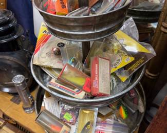 Vintage Bomber and Kill'r fishing lures on tiered stand