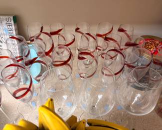 Set of red swirl stemware wine glasses