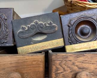 Antique carved drawer fronts and copper printing block
