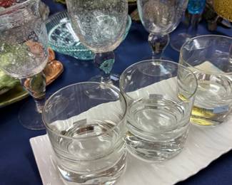 Bubble glass goblets and silver band rocks glasses