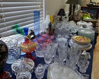 Large table of pressed glass and crystal