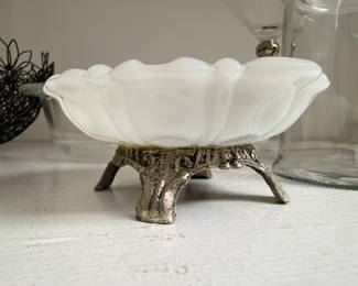 Milk glass bowl on ornate metal base