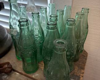 Collection of vintage Coca-Cola glass bottles