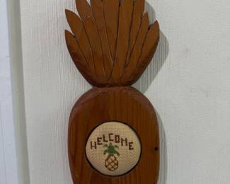 Carved wood pineapple welcome wall plaque