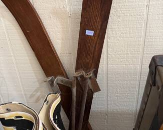 Antique wooden snow skis with leather bindings