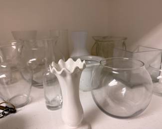 Assorted clear glass and milk glass vases