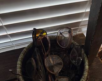 Basket of vintage eyeglasses and frames