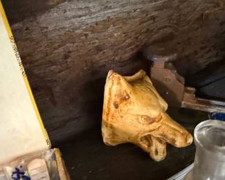 Carved wooden horse head figure