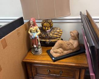 Oak two drawer nightstand with figural lamp