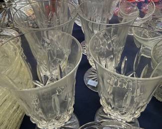 Set of pressed glass footed iced tea tumblers