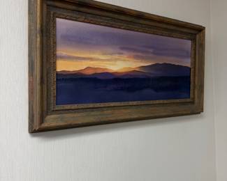 Framed sunset over water landscape painting