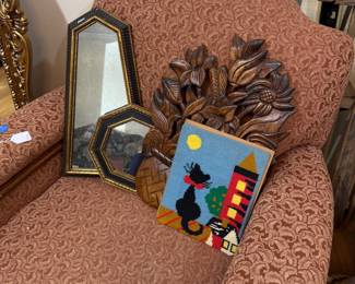 Carved wood floral wall plaque and gilt mirrors