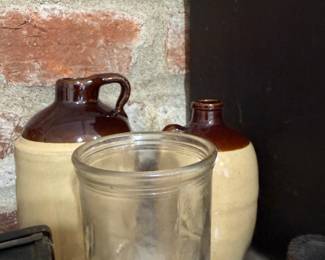 Antique stoneware jugs and pressed glass jar