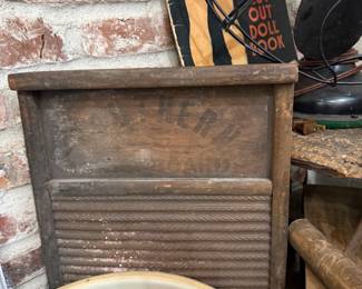 Antique wooden washboard with cut-out doll book