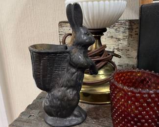 Cast iron rabbit with basket figural planter