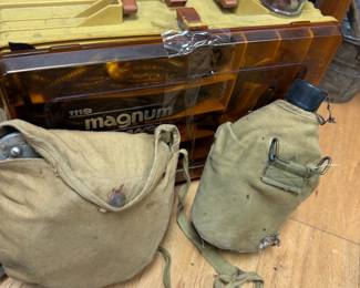 Canvas canteens with shoulder straps and wooden tool box