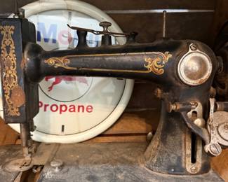 Antique cast iron sewing machine head with gold decals