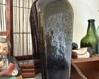 Antique olive green glass case gin bottle