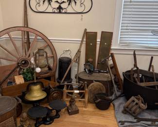 Wagon wheel, brass bell and cast iron balance scales