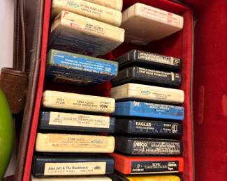 Case of vintage 8-track tapes with Eagles and Johnny Cash