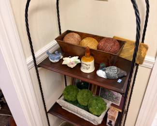 Wrought iron etagere with decorative accents