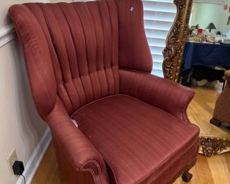 Channel back wingback armchair with carved claw feet
