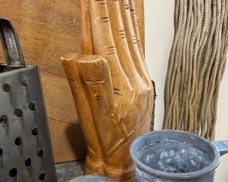 Carved wooden praying hands sculpture