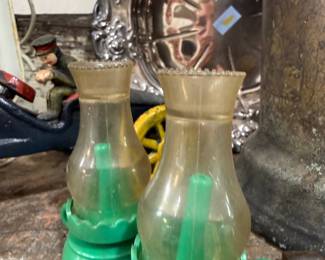 Pair of green kerosene finger lamps with chimneys