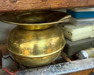 Antique brass spittoon with primitive hand tools