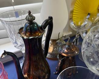 Iridescent glass coffee pot with figural finial