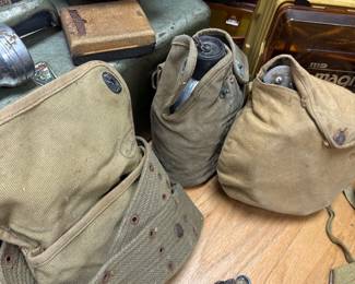 Vintage canvas military canteens with web belt