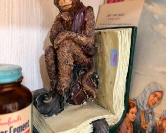 Resin monkey on open book bookend