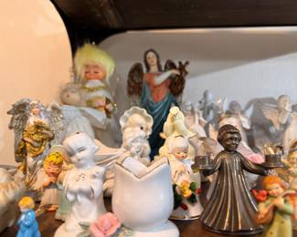 Collection of porcelain angel figurines