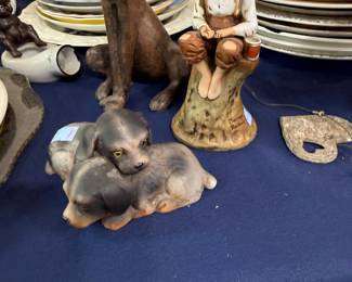 Norman Rockwell boy figurine and puppy figurine
