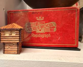 Koh-I-Noor Rapidograph box and log cabin bank