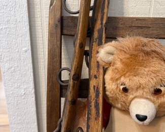 Antique wooden runner sled and Teddy Ruxpin bear